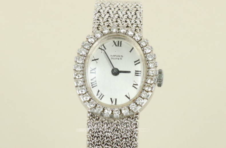 Damenarmbanduhr, 585er WG, ca. 43 g.,