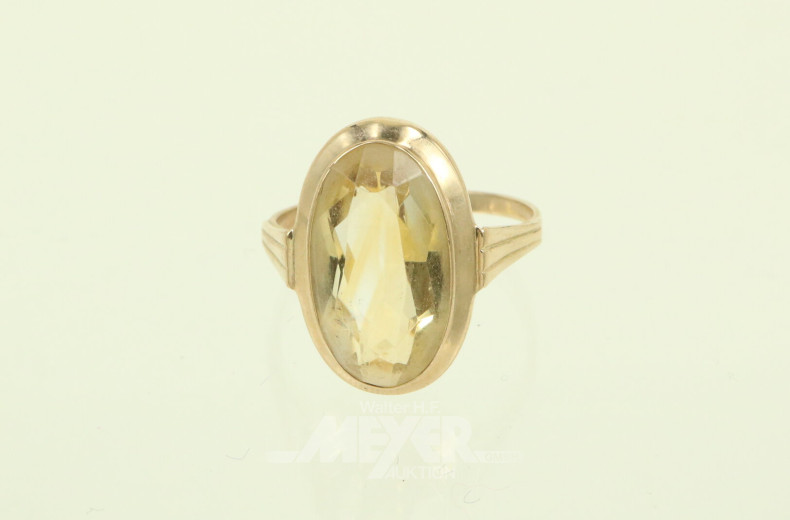 Ring, beetzt mit 1 gelben Citrin, oval facettiert