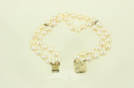 doppelreihiges Perlenarmband mit schmucker Goldschließe