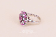 Damenring mit 8 kl. Brillanten, zusammen ca. 0.4ct und 9 kl. Rubinen