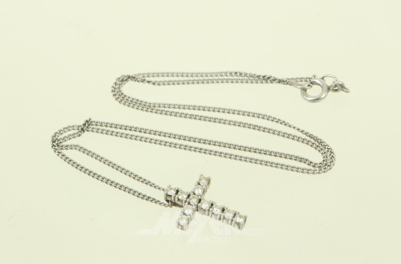 Kette mit Kreuzanhänger und 11 kl. Brillanten von insgesamt 0.4ct