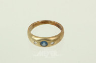 Ring mit blauem Farbstein und 2 kl. Diamantimitationen