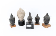 5 versch. kl. Buddhaköpfe