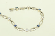Gliederarmband, mit 7 kl. Saphiren und 6 kl. Brillanten von zus. ca. 0.60ct