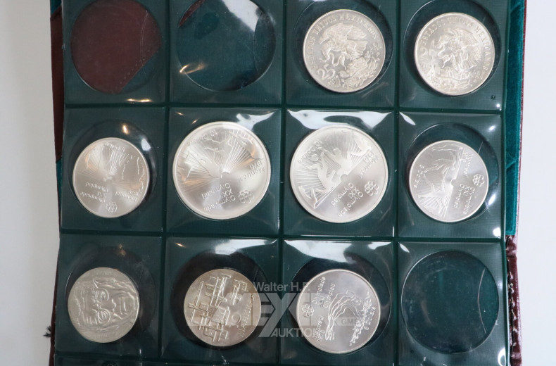 Münzalbum mit verschiedenen Silbermünzen