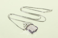 Collier mit 1 Amethyst in Wappenform sowie 10 kl. Brillanten