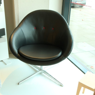 Sessel mit Fußkreuz