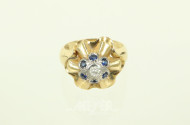 Damenring, besetzt mit 1 Brillanten und 6 kl. Saphiren