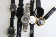 8 Herrenarmbanduhren sowie 1 Paar Manschettenknöpfe