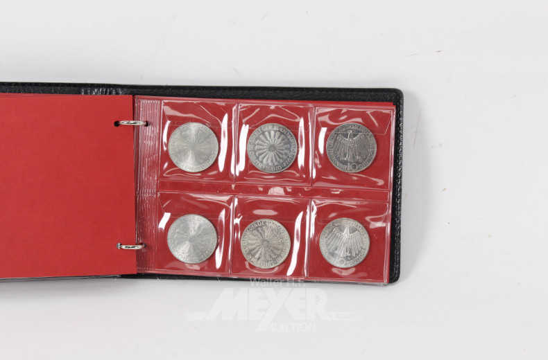 Münzalbum mit Silbermünzen und Kleinmünzen aus aller Welt