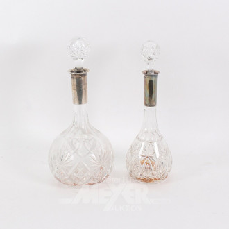 2 Kristall-Karaffen mit 800er Silbermontierung