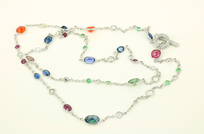Kette, ausgefasst mit nat. Diamanten in versch. Schliffformen sowie Rubelite, Saphire, Opale, Peridot