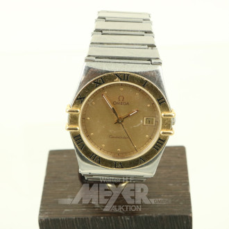 Armbanduhr mit vergoldeter Lünette