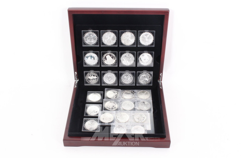 Konvolut 'Die 15 berühmtesten Silbermünzen der Welt' in Holzkassette