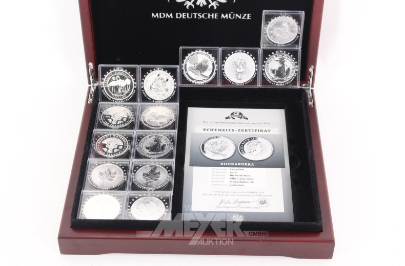 Konvolut 'Die 15 berühmtesten Silbermünzen der Welt' in Holzkassette