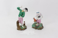 2 Porzellanfiguren "Bäuerin" u. "Knabe mit Hund"