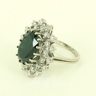 Damenring, besetzt mit 1 Saphir 9,5ct. sowie 28 nat. Diamanten im Brillantschliff von zus. ca. 1,10ct wess/si