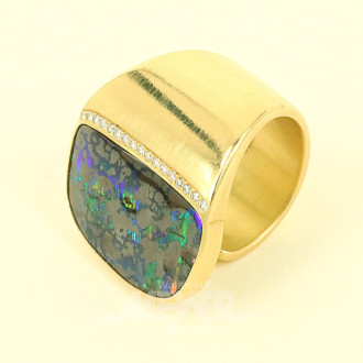 Damenring, besetzt mit 1 Vollopal sowie 17 nat. Diamanten im Brillantschliff von zus. ca. 0,17ct. wess/vsi