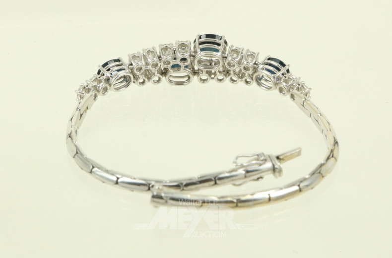 Armband mit 4 oval facettierten Saphiren und 16 Brillanten von zus. ca. 1,60 ct. (vsi-si/w-tcr.)