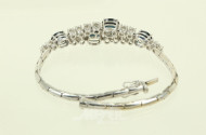 Armband mit 4 oval facettierten Saphiren und 16 Brillanten von zus. ca. 1,60 ct. (vsi-si/w-tcr.)