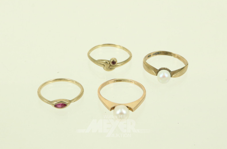 4 Ringe, davon 2 mit Perle u. 2 mit kl. Rubin