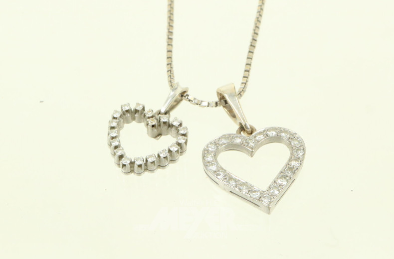 Kette in 750 WG mit Schließe in 585 WG punziert, sowie 2 Anhänger 'Herz' in 750 WG mit kl. Brillanten
