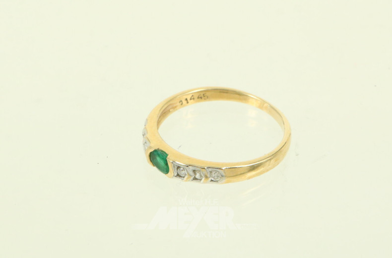 Damenring, besetzt mit 1 Smaragd und 6 kl. Diamanten