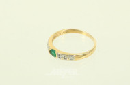 Damenring, besetzt mit 1 Smaragd und 6 kl. Diamanten