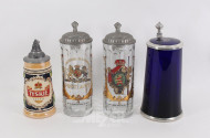 4 versch. Bierkrüge mit Zinndeckel