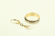 Bandring mit drehbarem Innenring sowie 1 Ohrhänger mit Perle