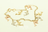 Armband in 750 GG mit kl. Delfinen in tricolor