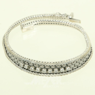 Armband, besetzt mit 9 Brillanten von zus. ca. 0,20 ct.