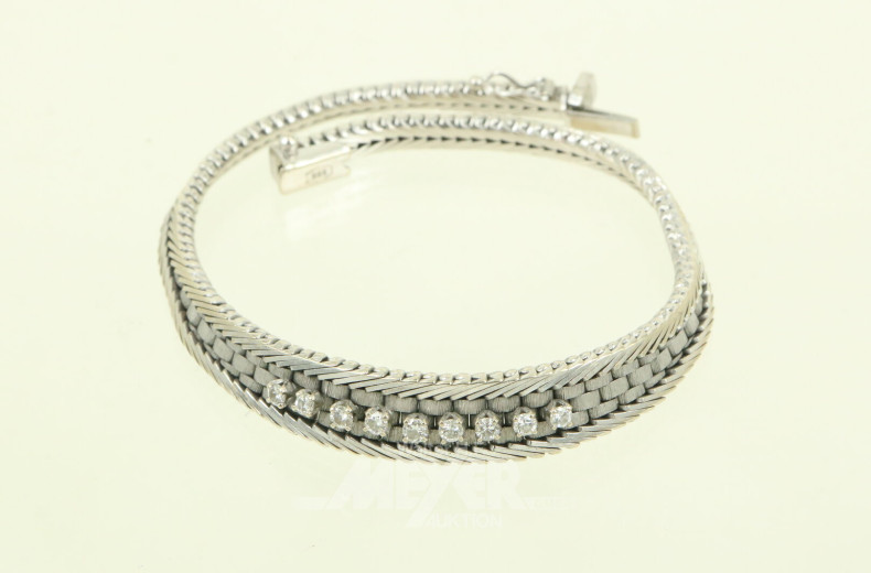 Armband, besetzt mit 9 Brillanten von zus. ca. 0,20 ct.