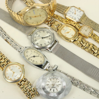 7 versch. Armbanduhren u. 1 Anhängeruhr