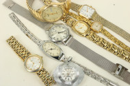 7 versch. Armbanduhren u. 1 Anhängeruhr