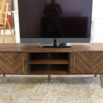 Lowboard in Parkett-Optik auf goldfarbenen Füßen