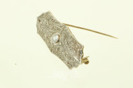 Art Déco Brosche mit 1 Brillant u, kl. Diamantrosen