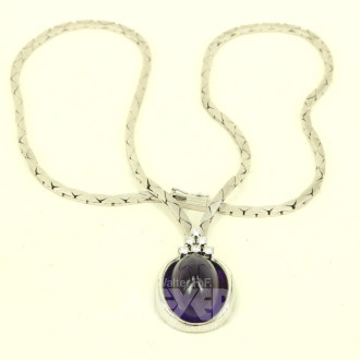 Collier im Verlauf mit 1 Amethystcabochon u. 6 kl. Brillanten von ges. ca. 0,3 ct