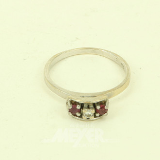 Damenring mit 1 kl. Diamant u. 2 kl. Rubinen