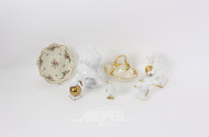 7 Porzellanteile: Putti m. gold. Ball, Schalen,  Vogelfiguren