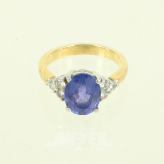 Ring, mit 1 Tanzanit, oval facettiert, u. 6 kl. Brillanten