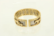 Armspange, Metall mit 750er Goldbeschlag und Motiv 'schreitender Panther'