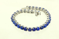 Armband, besetzt mit 33 kl. Lapislazuli-Cabochons