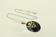 Kette, Medaillon und Zahngold