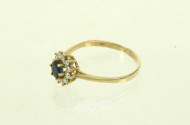 Damenring mit 1 Saphir u. 12 kl. Brillanten