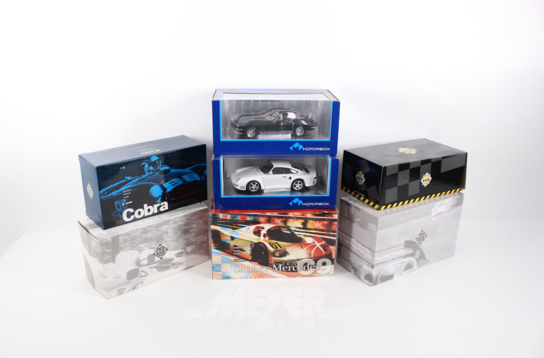 7 versch. Modellautos, 1:18