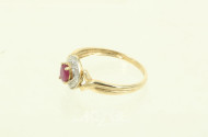 Damenring mit 1 Rubin u. Diamantrosen