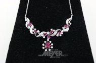 Collier, im Verlauf besetzt mit Rubinen u. Brillanten