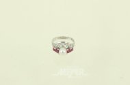 Ring mit Perle u. 4 kl. Rubinen