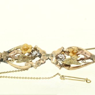 Antike Brosche mit floralen Elementen